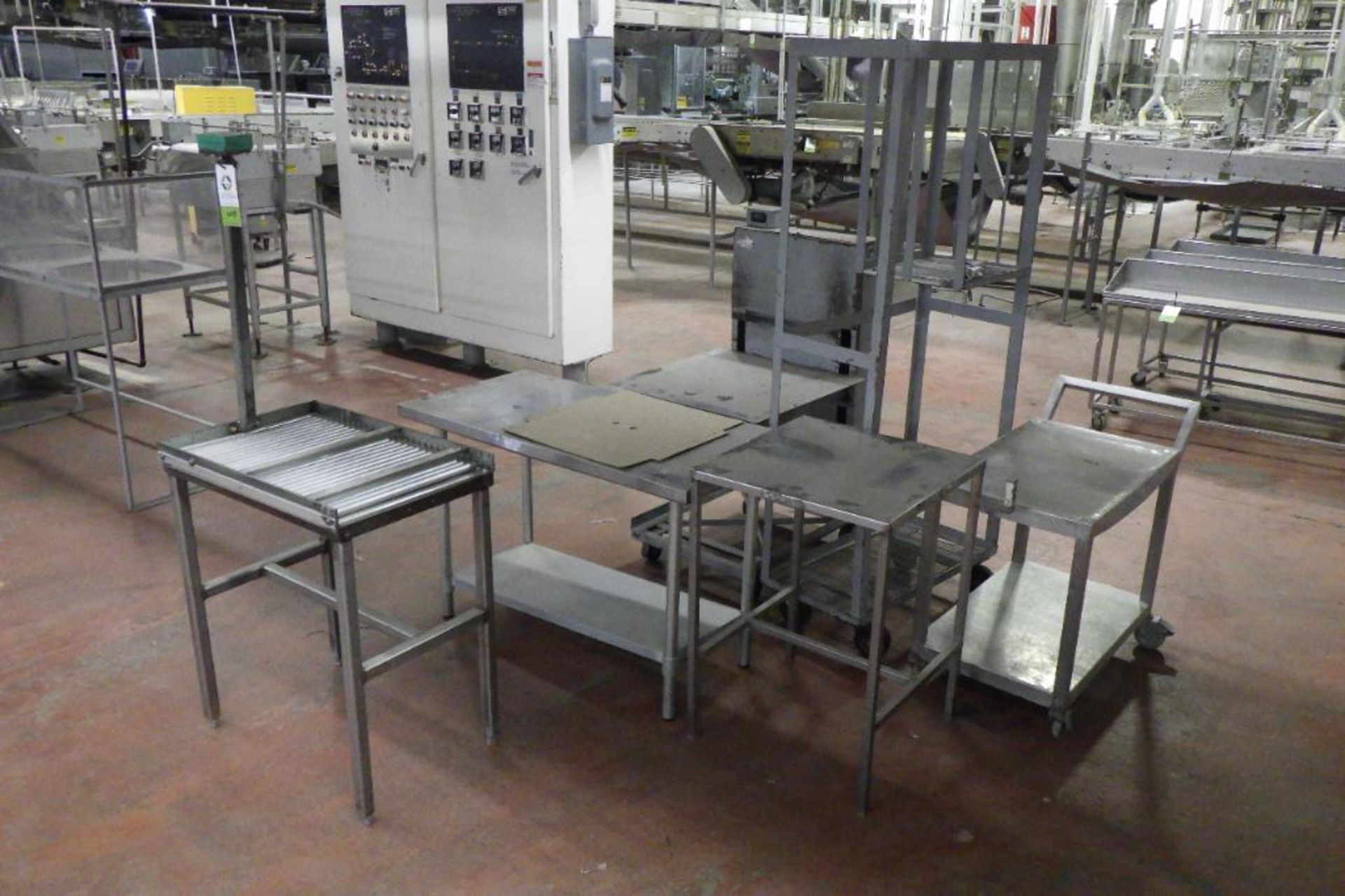 Lot of assorted tables and stands