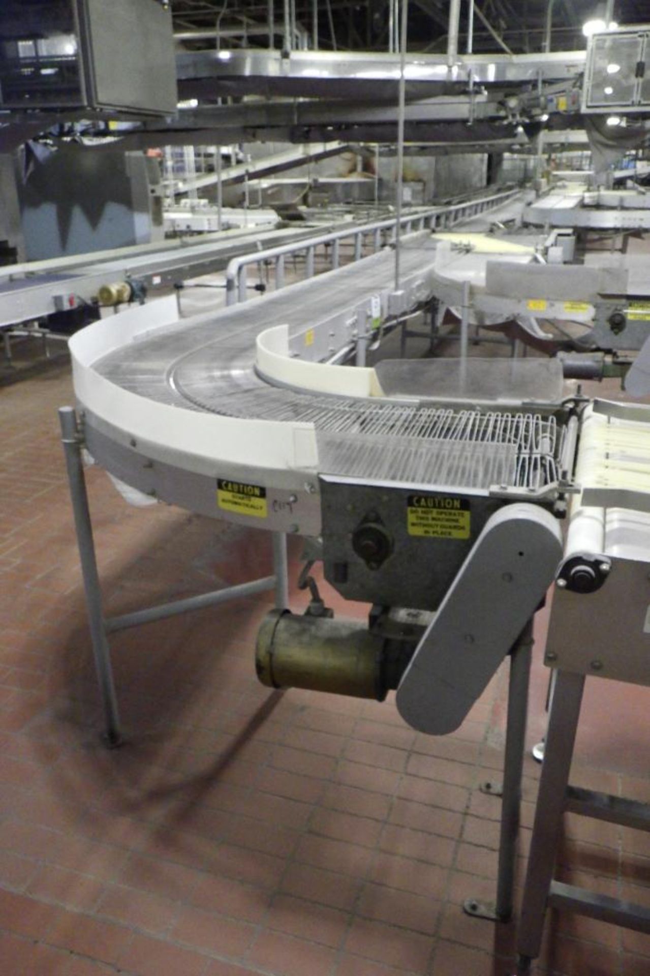 Stewart Systems 90 degree wire belt conveyor