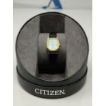 RRP £99.00 Citizen Ladies' Gold Tone Black Strap Eco-Drive Watch.