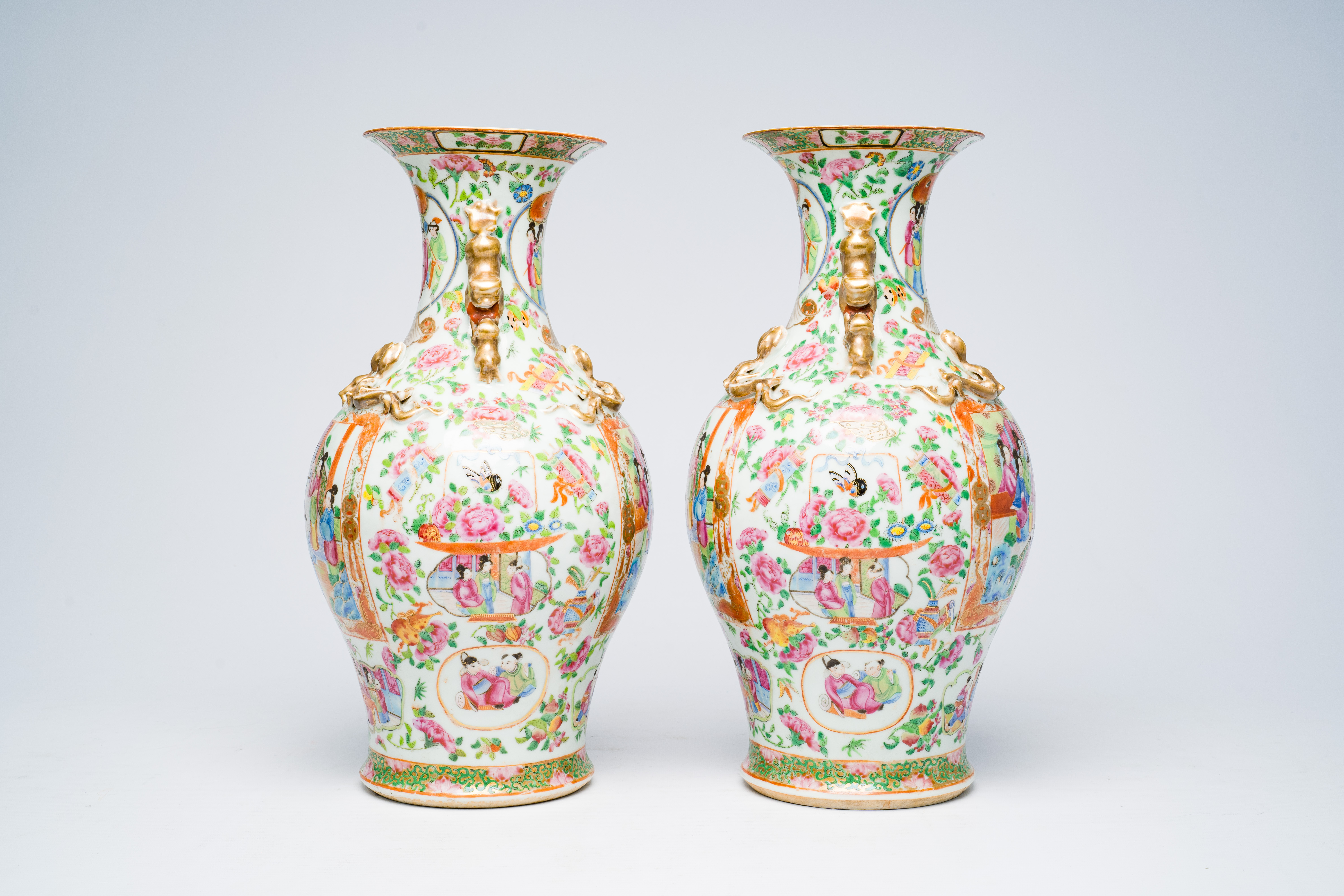 A pair of Chinese Canton famille rose vases with palace scenes, floral design and antiquities, 19th - Image 4 of 28