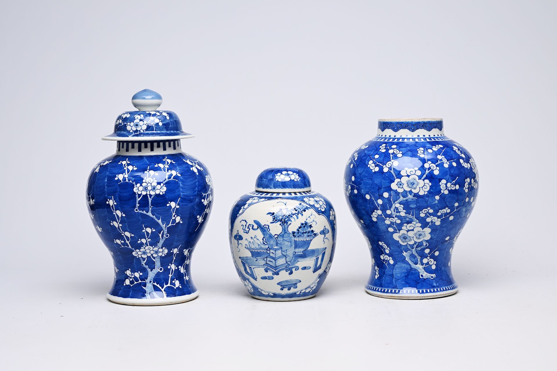 Two Chinese blue and white prunus on cracked ice ground vases and a jar and cover with antiquities, - Image 3 of 16