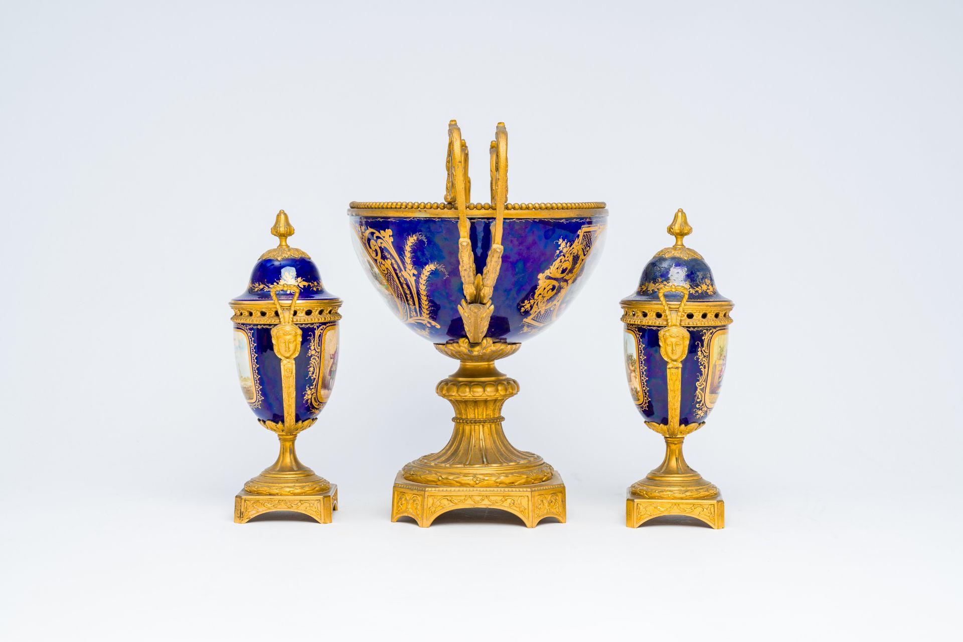 A three piece Sevres-style porcelain garniture with gilt bronze mounts, France, 19th C. - Image 3 of 7