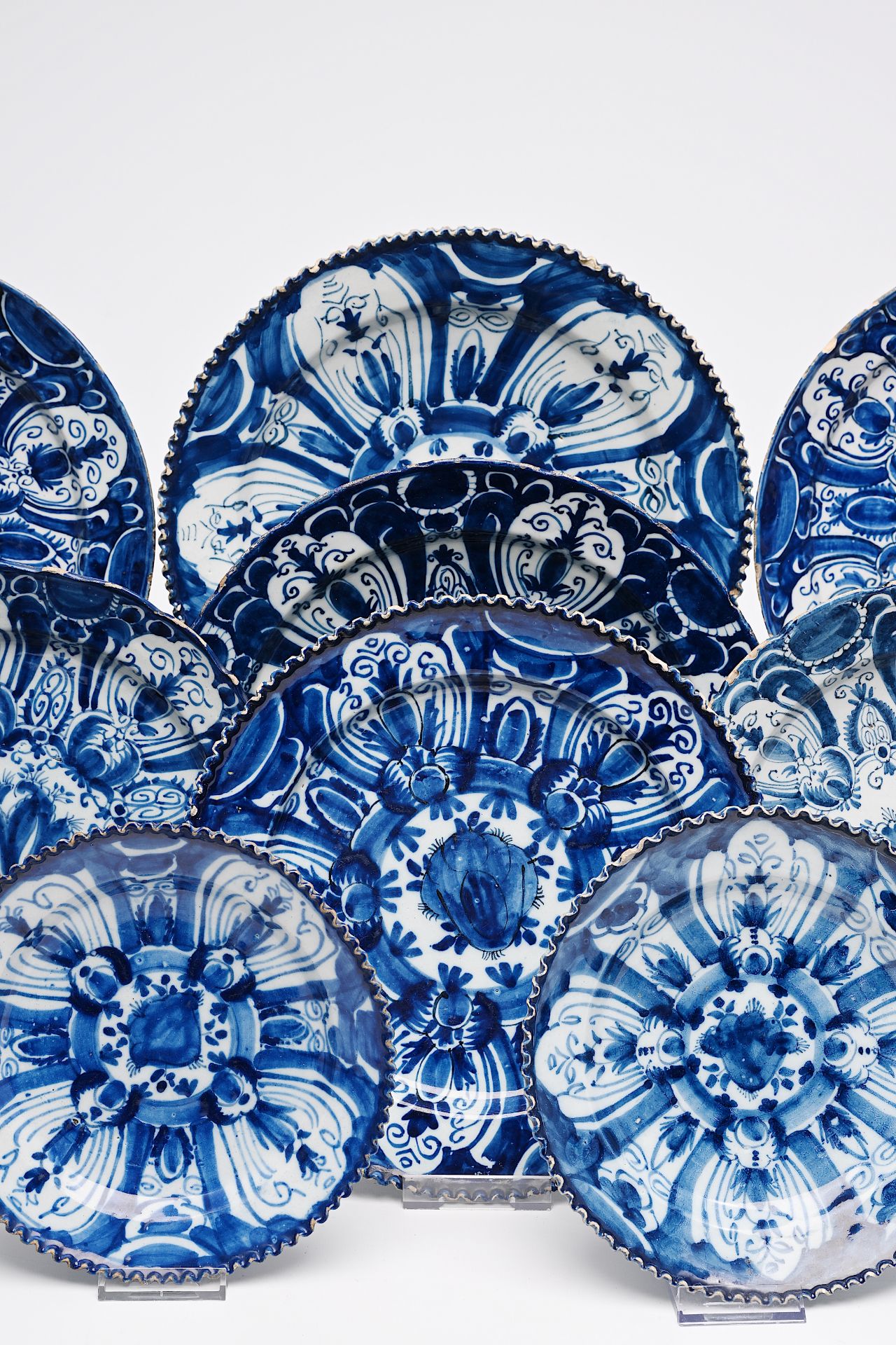 A varied collection of Dutch Delft blue and white plates and dishes with floral design, 18th C. - Image 2 of 8