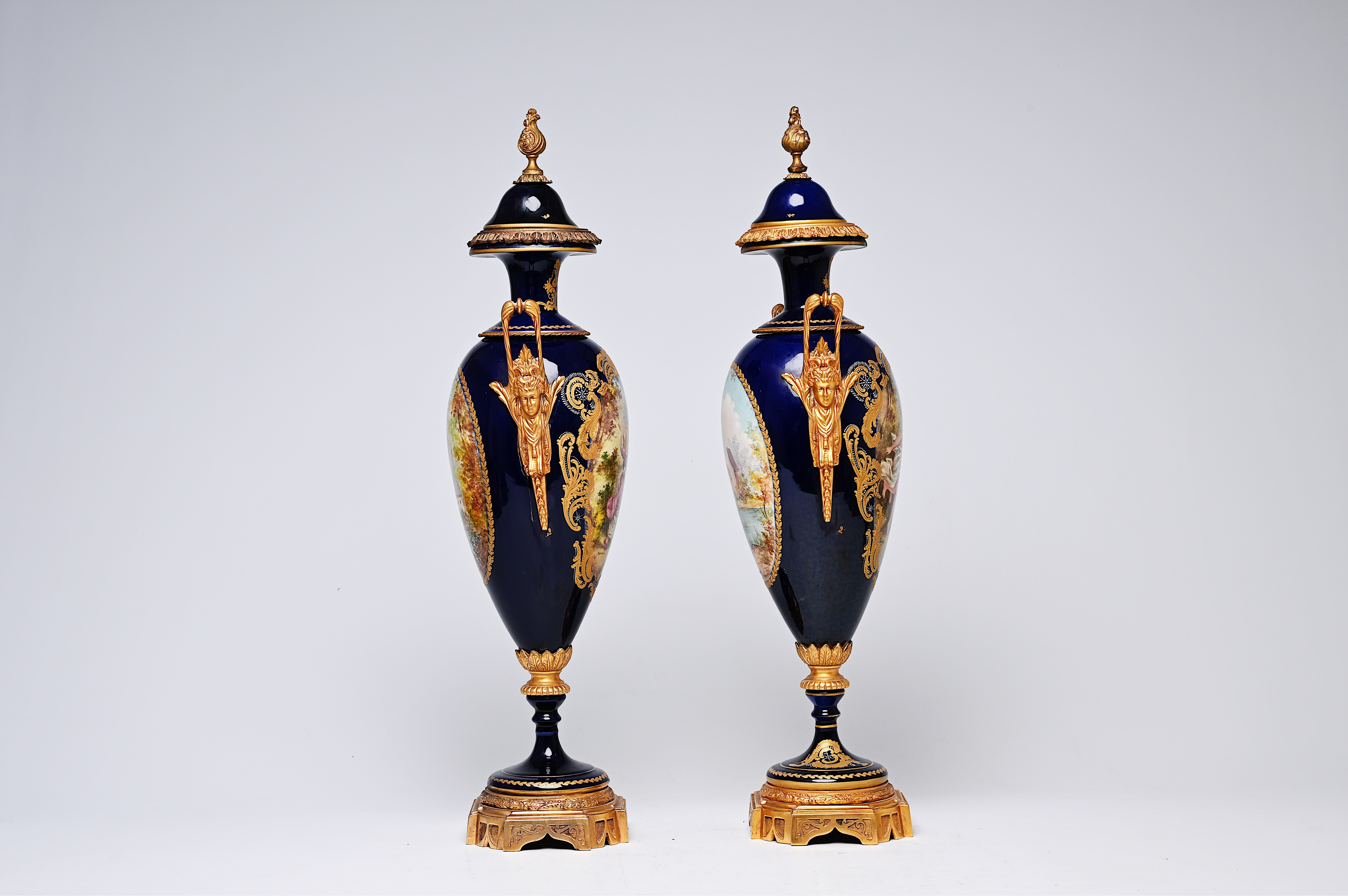 A pair of French gilt bronze mounted gold layered blue ground Sevres style vases and covers with lan - Image 2 of 9