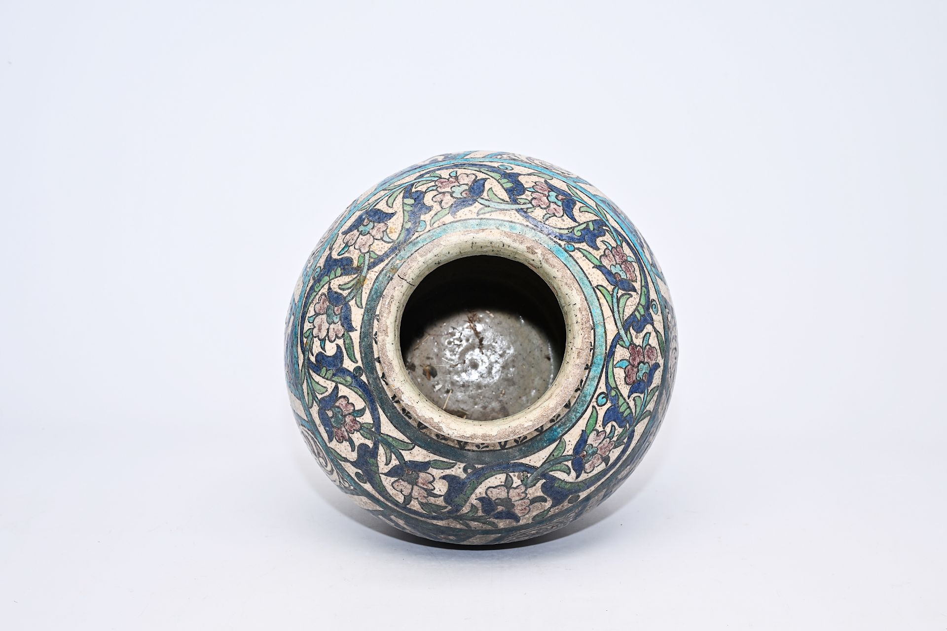 A polychrome pottery jar with floral and calligraphic design, Iran, 19th C. - Image 6 of 9