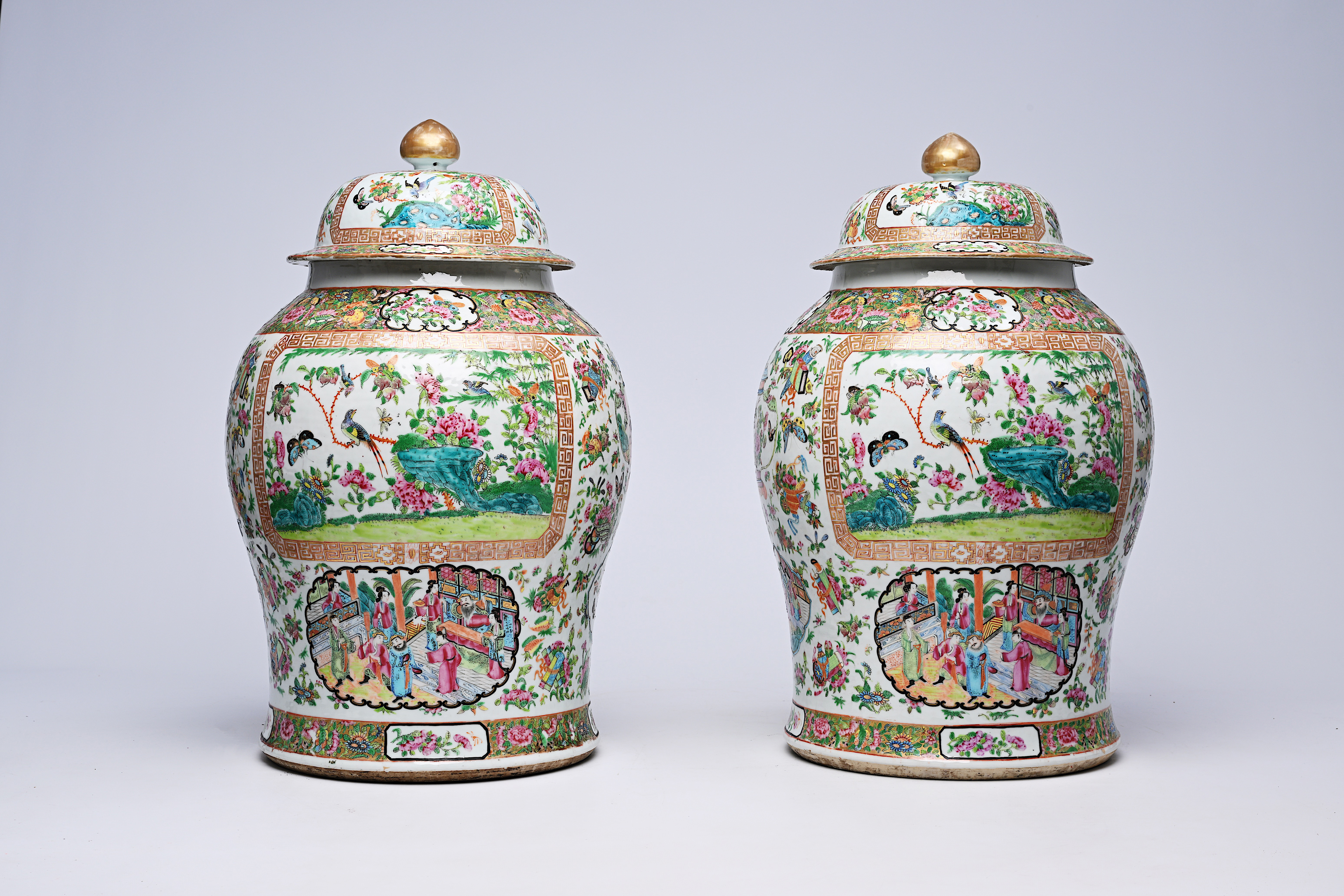A pair of Chinese Canton famille rose vases and covers with palace scenes and birds and butterflies - Image 2 of 12