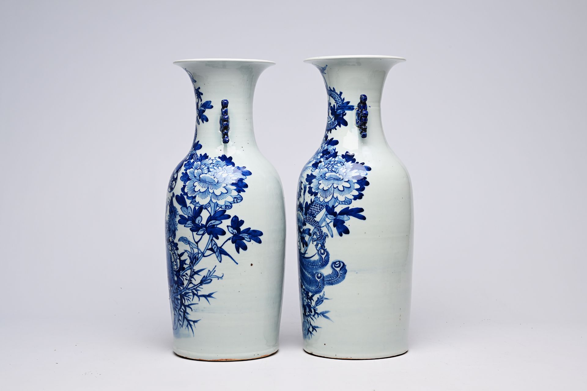 A pair of Chinese blue and white celadon ground vases with a dragon and a phoenix among blossoming b - Image 3 of 28