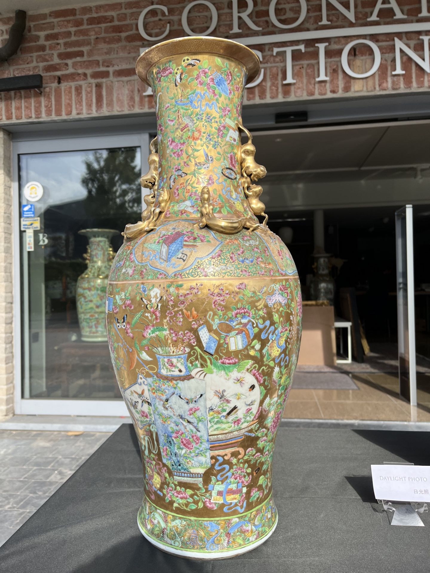 A pair of Chinese Canton famille rose gold ground vases with birds and butterflies among blossoming - Image 23 of 60