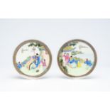 Two Chinese famille rose plates with figures on a terrace, signed Zou Yunzhen é„’é›²ç, 20th C.