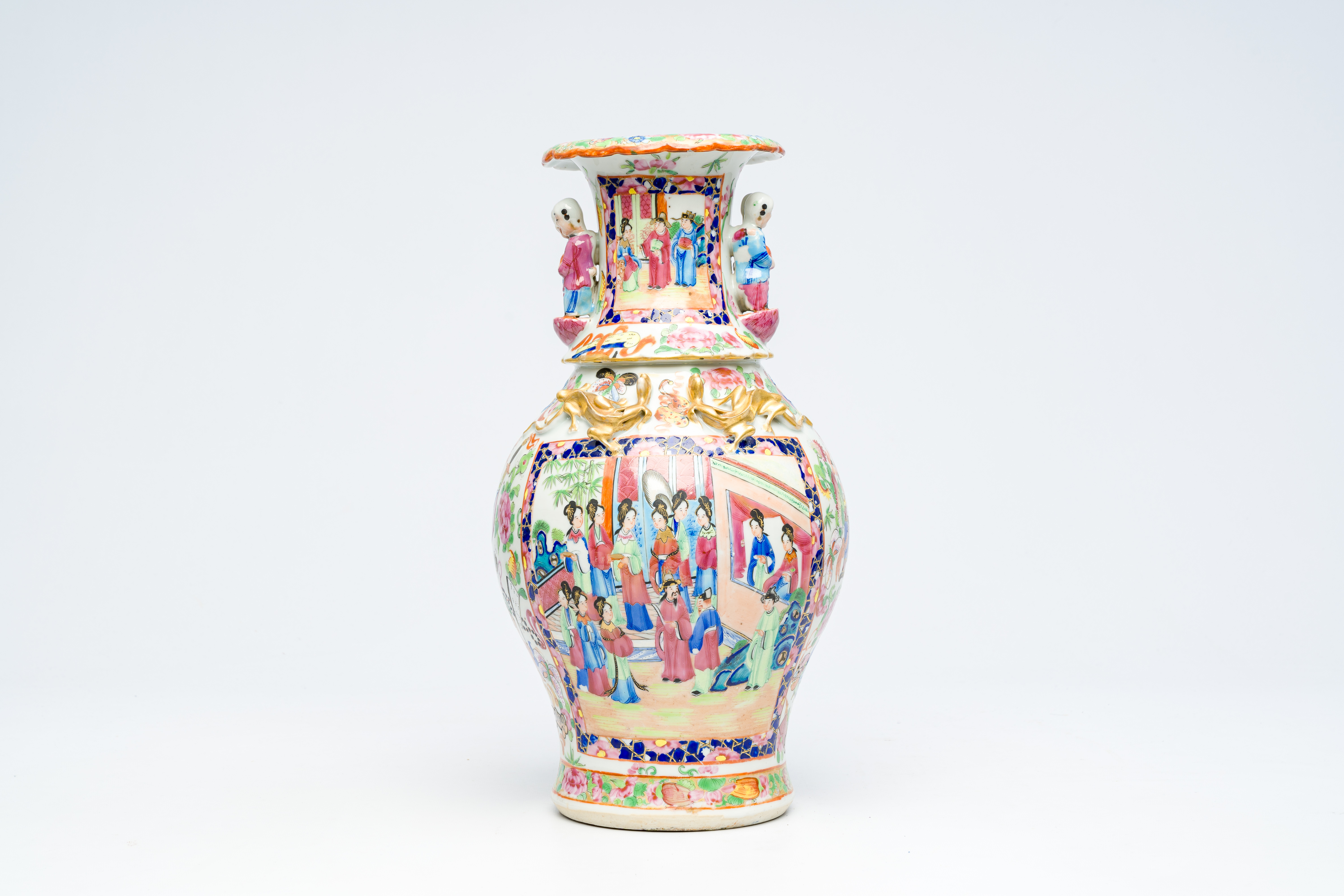 A Chinese Canton famille rose vase with palace scenes and the Hehe Er Xian twins in relief, 19th C. - Image 3 of 6