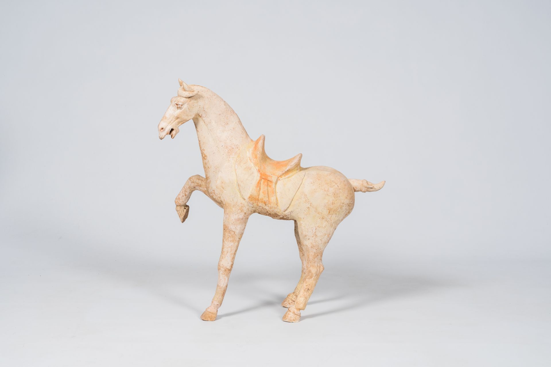 A Chinese polychrome painted pottery model of a horse, Tang