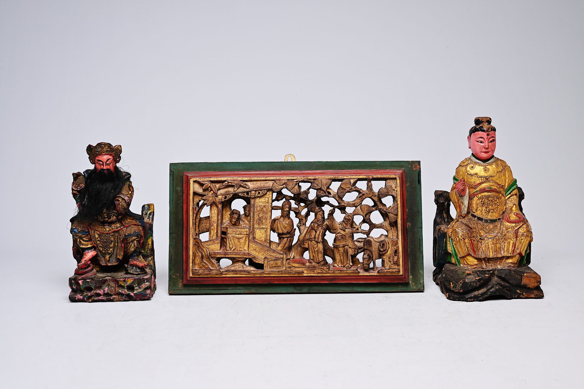 Two Chinese polychromed wood votive figures and a gilt panel, 19th C. - Image 2 of 7