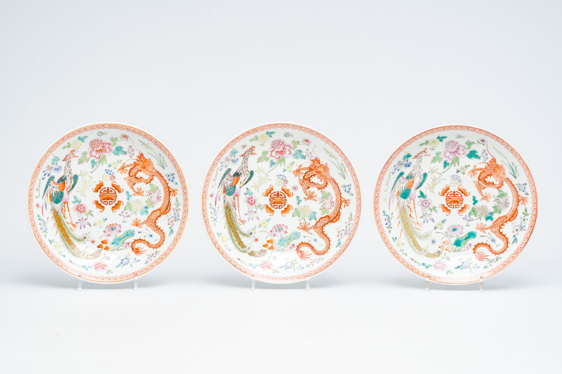Six Chinese famille rose 'dragon and phoenix' dishes, Qianlong mark, 20th C. - Image 4 of 14