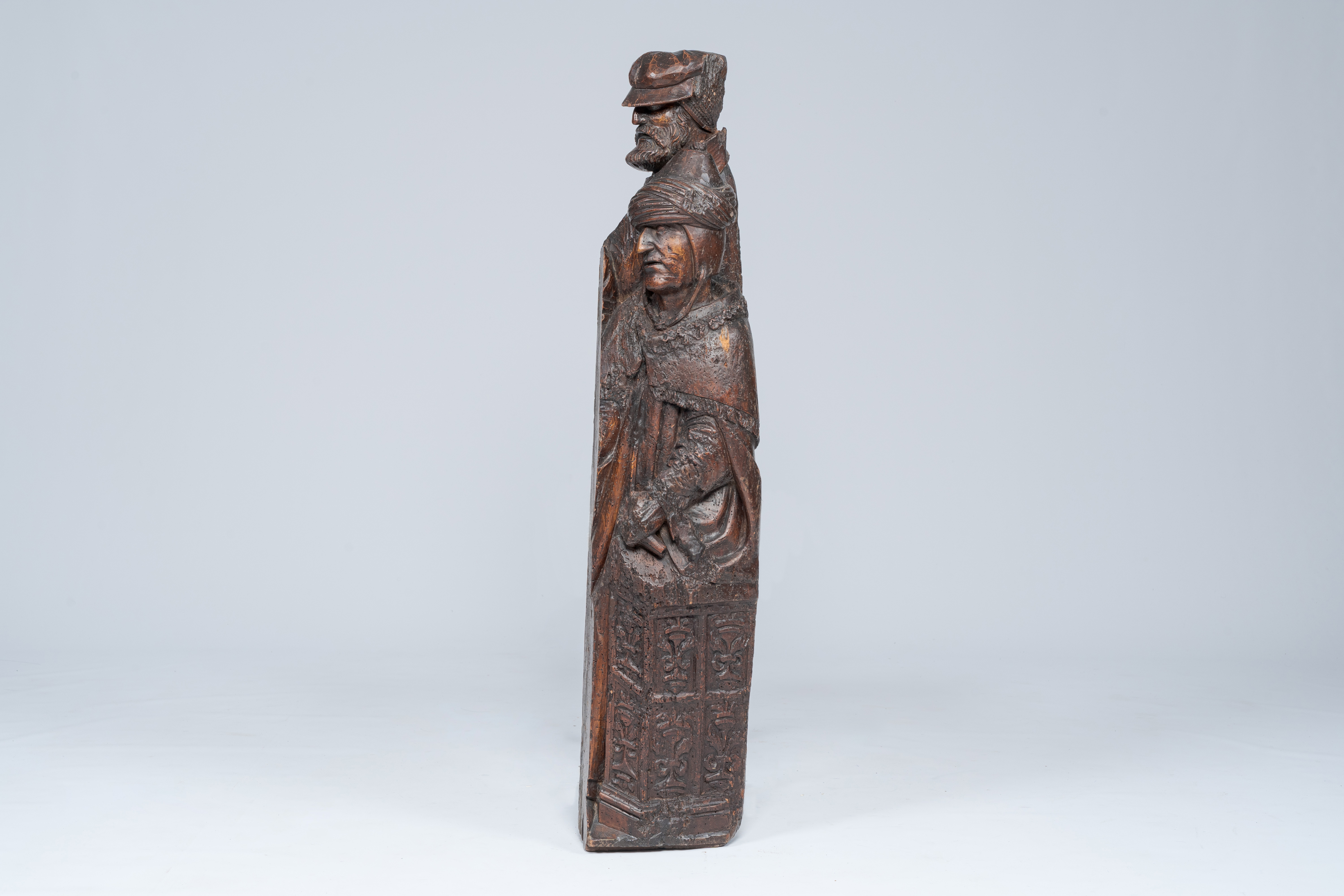 A large Flemish or French carved wood group with two figures in Burgundian costume, 16th C.