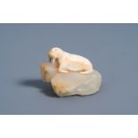 European school: A carved ivory figure of a walrus sitting on a gemstone ice floe, late 19th C.