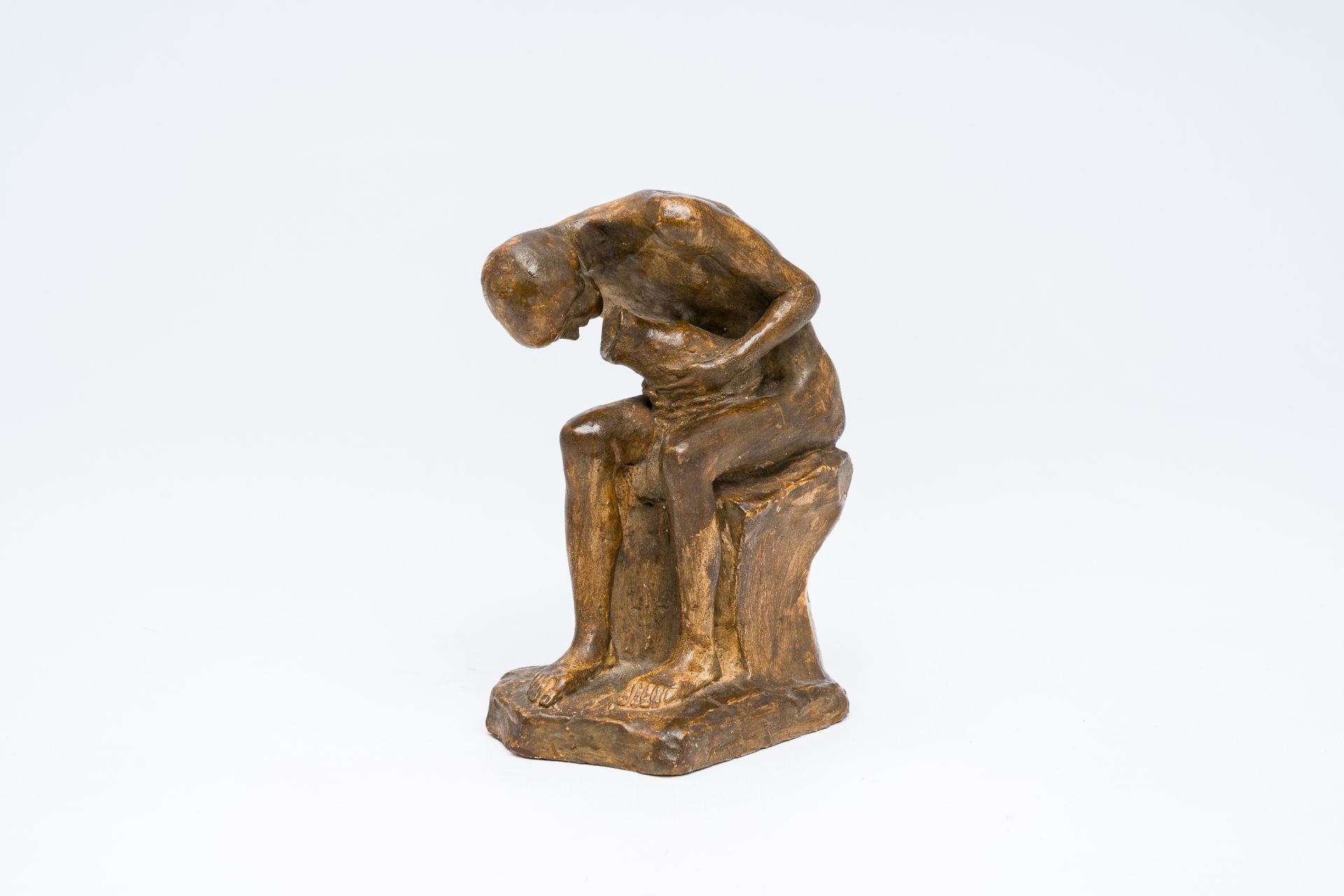 Constant Montald (1862-1944): A seated young man with a jug, patinated plaster, dated 1900