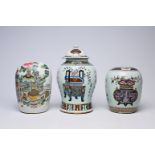 A Chinese famille rose vase and cover and two ginger jars with antiquities, 19th/20th C.