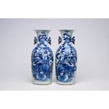 A pair of Chinese blue and white celadon ground vases with a dragon and a phoenix among blossoming b