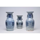 Three Chinese blue and white 'Xi' vases, 19th/20th C.