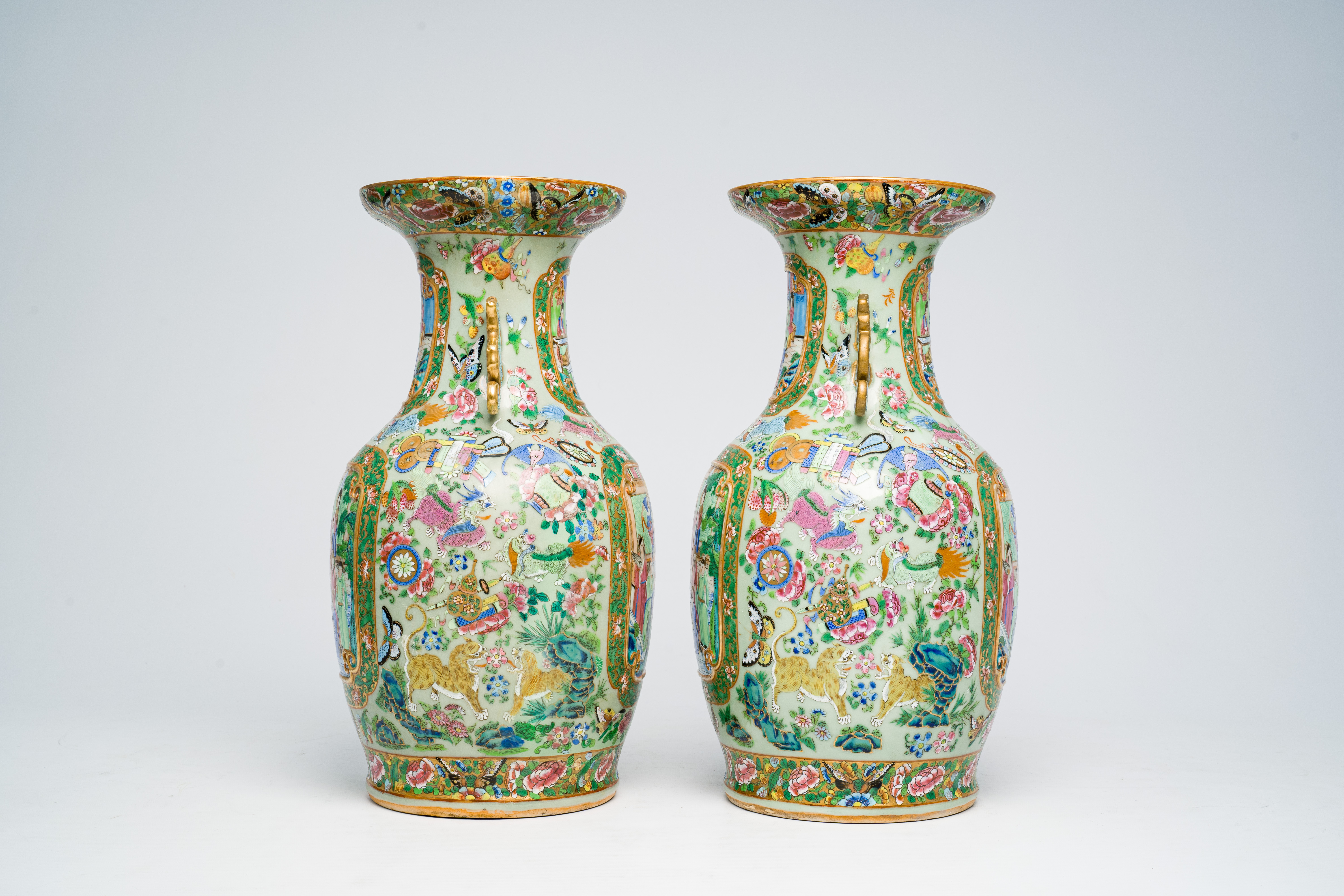 A pair of Chinese Canton famille rose celadon ground vases with palace scenes, animals and antiquiti - Image 4 of 64