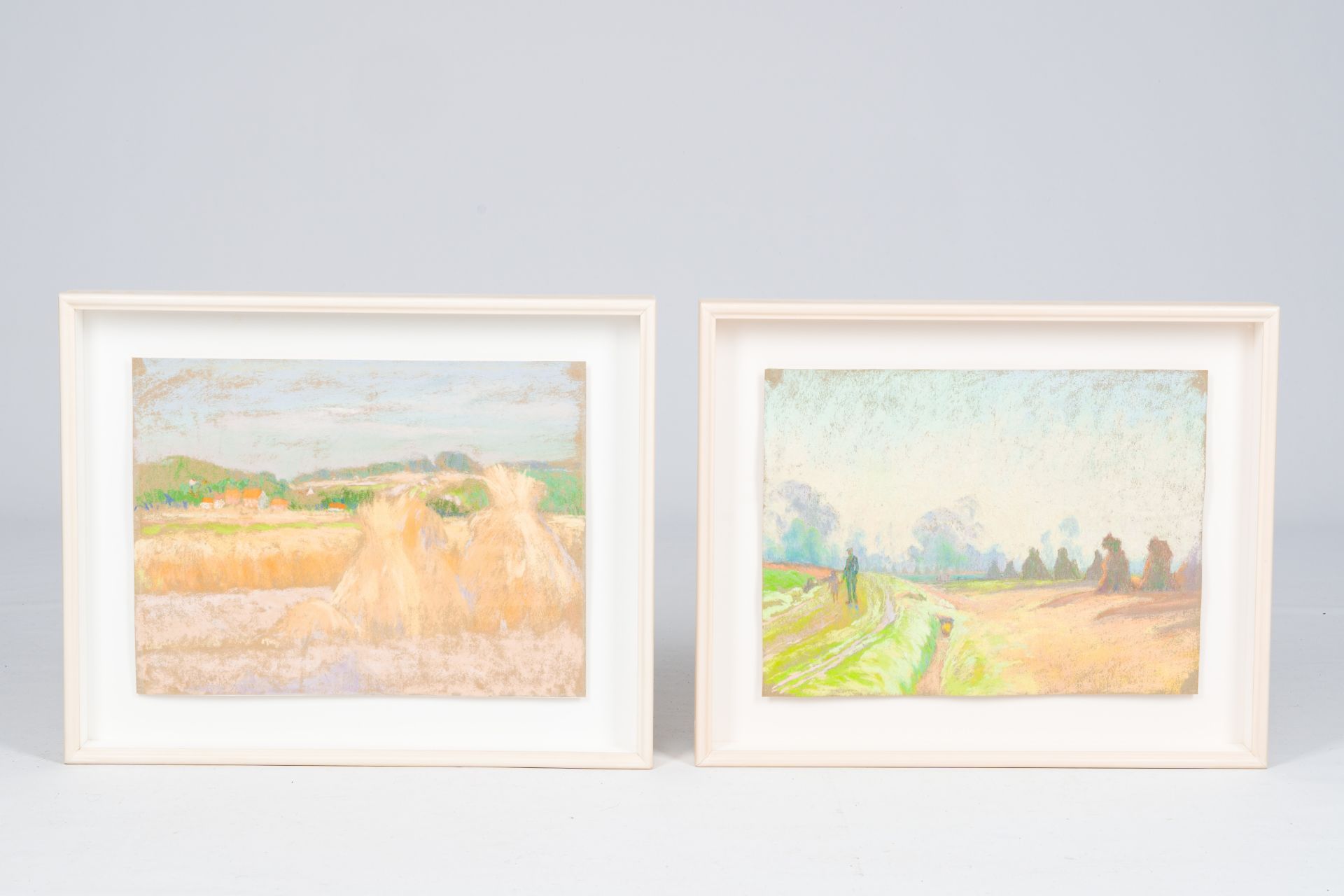 Rodolphe De Saegher (1871-1941): Two landscapes with haystacks, pastel on paper, one dated 1923