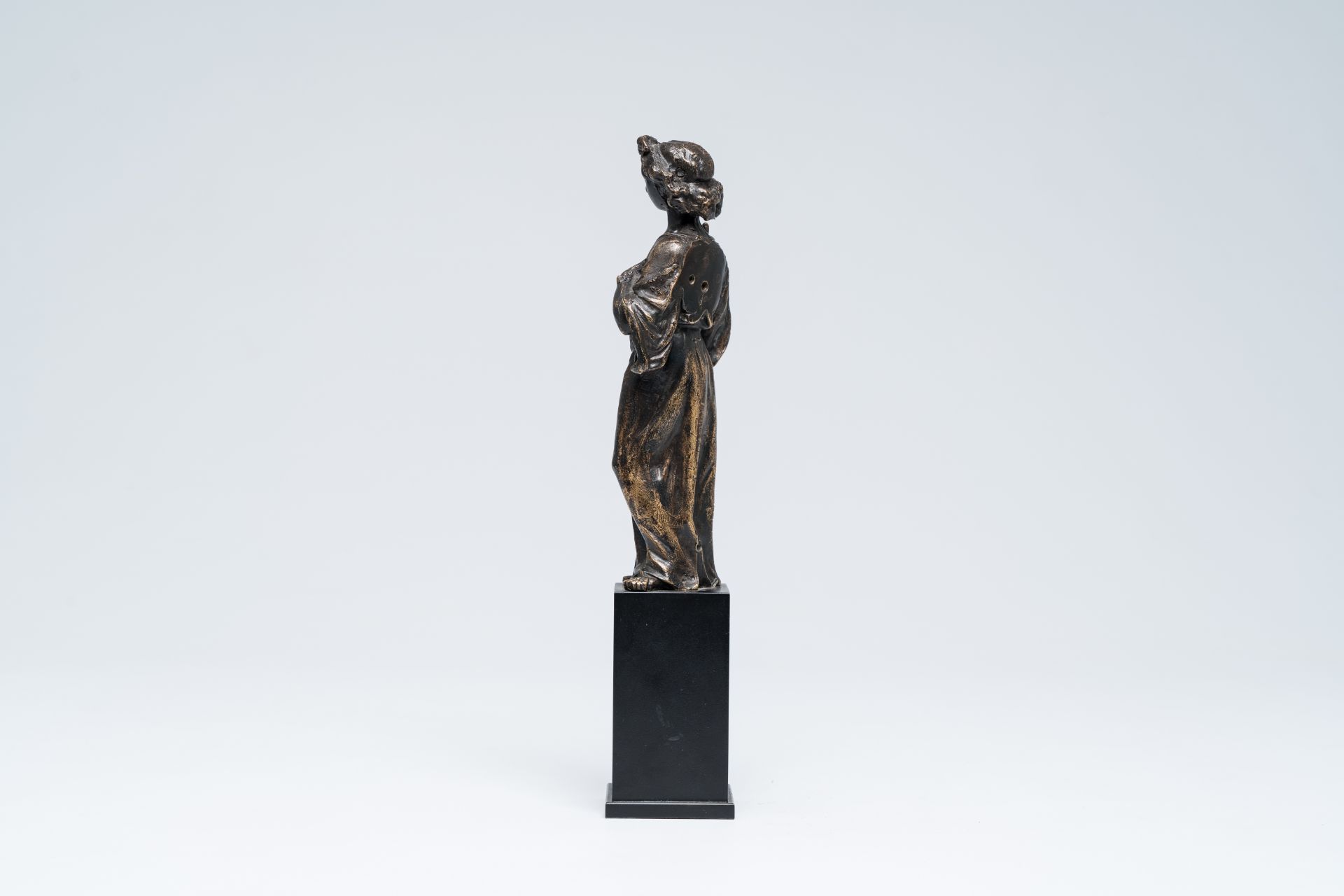 A Flemish or French patinated bronze standing and blessing angel, 16th C. - Image 3 of 9