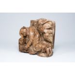 A probably German carved walnut group depicting the sleeping apostles Peter and John with remains of