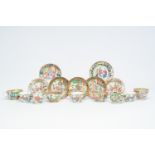 Nine Chinese Canton famille rose cups and seven saucers, 19th C.