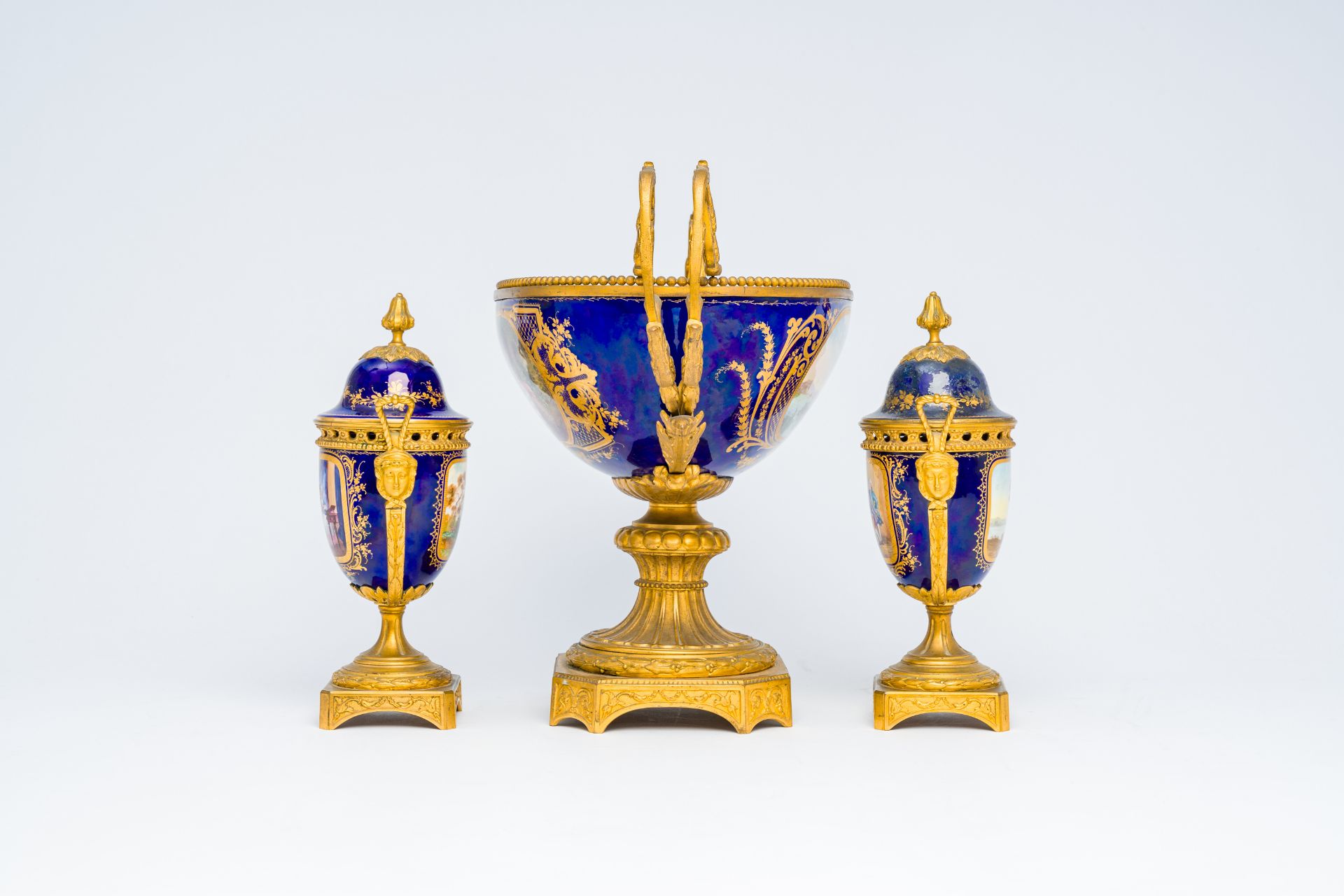 A three piece Sevres-style porcelain garniture with gilt bronze mounts, France, 19th C. - Image 4 of 7