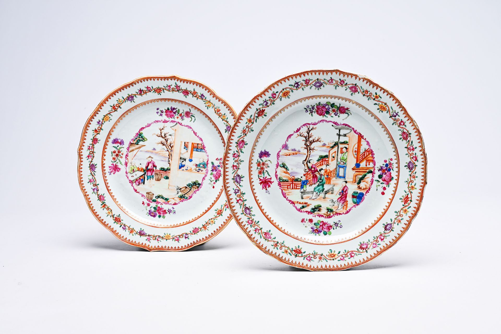 A pair of Chinese famille rose 'mandarin subject' dishes, Qianlong