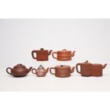 Six various Chinese Yixing stoneware teapots and covers one with enamelled design, 19th/20th C.