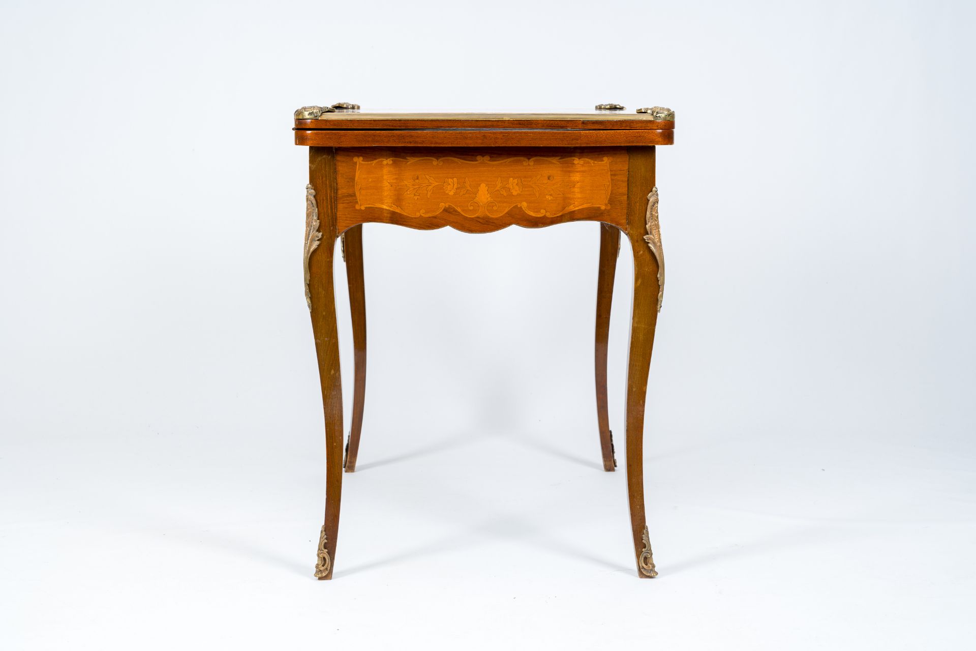 A French bronze mounted wood game table with marquetry top, 19th/20th C. - Image 8 of 10