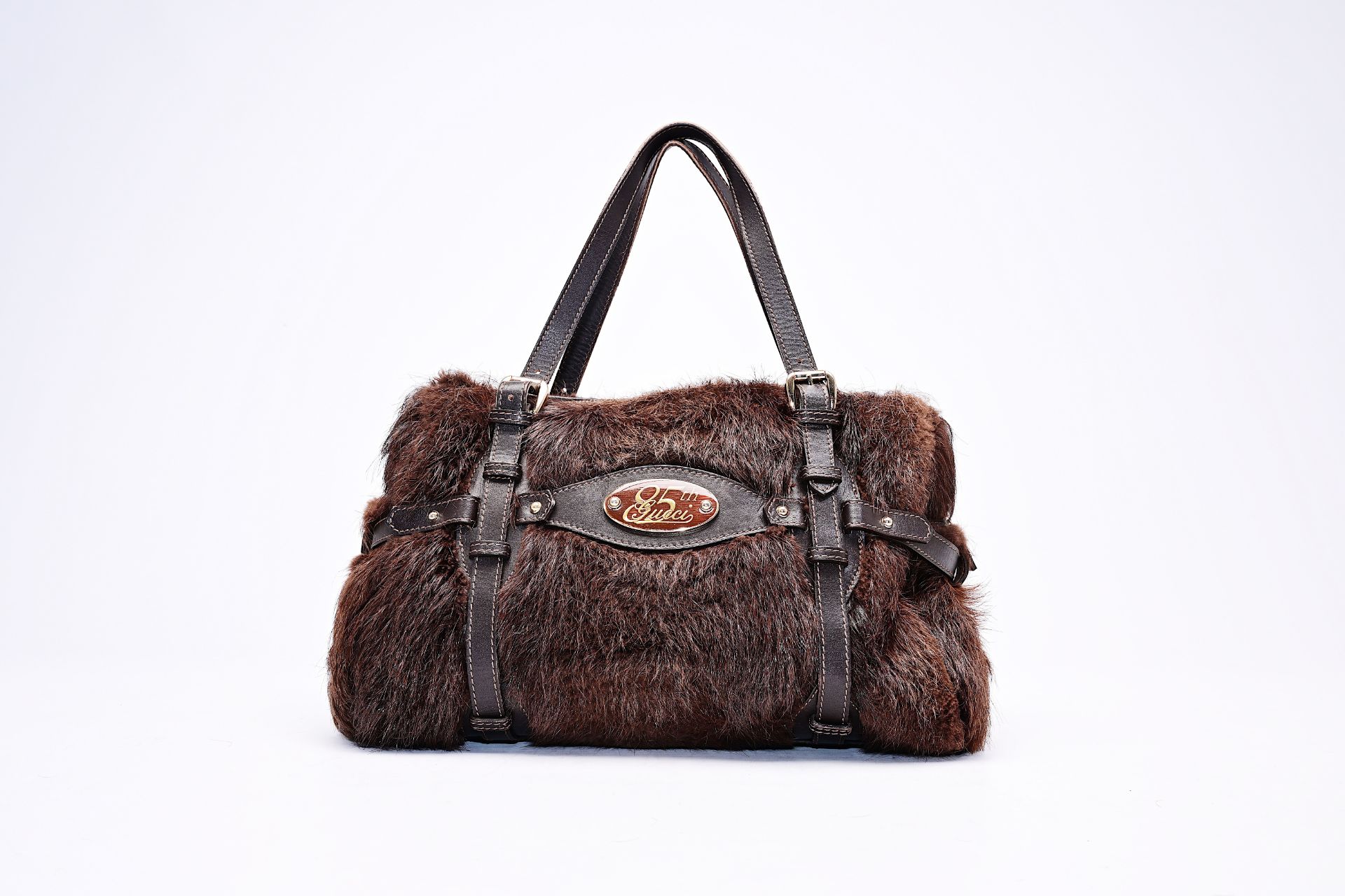 An Italian Gucci limited edition 85th anniversary fur and leather handbag, 20th C.