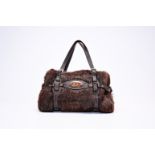 An Italian Gucci limited edition 85th anniversary fur and leather handbag, 20th C.