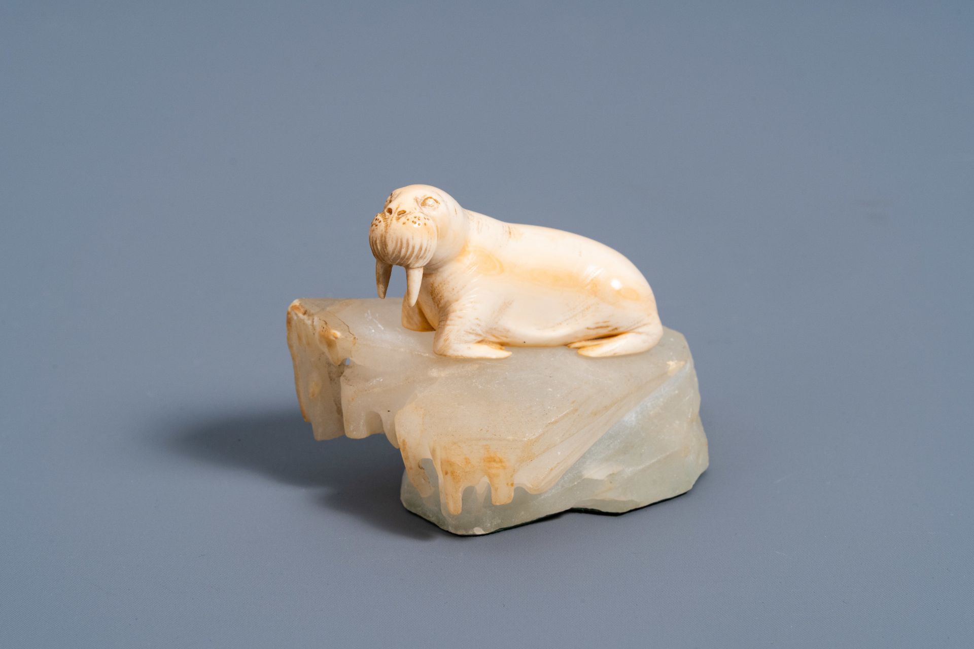 European school: A carved ivory figure of a walrus sitting on a gemstone ice floe, late 19th C. - Image 2 of 11