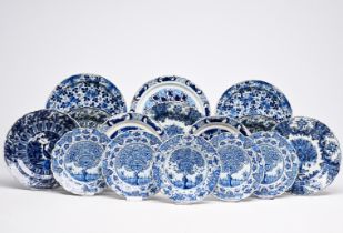 Fifteen Dutch Delft blue and white dishes with tea tree designs and chinoiserie dragons, 18th C.