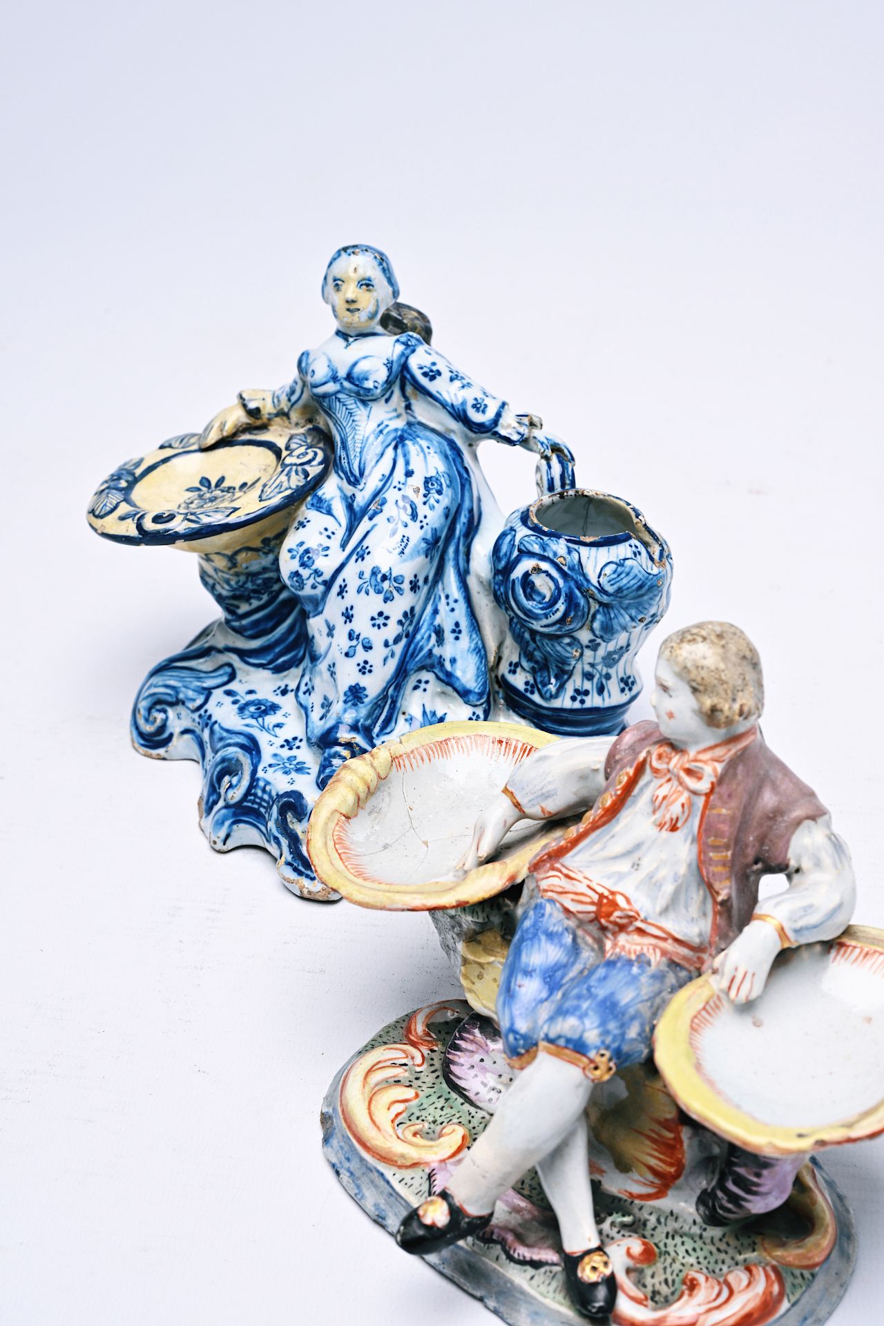 Two Dutch Delft blue and white and polychrome salts in the form of a man and a woman, 18th/19th C. - Image 6 of 6