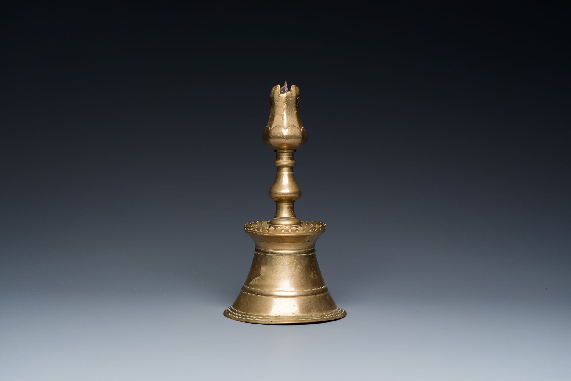 A Turkish bronze candlestick with tulip-shaped sconce, 18th C. - Image 3 of 7