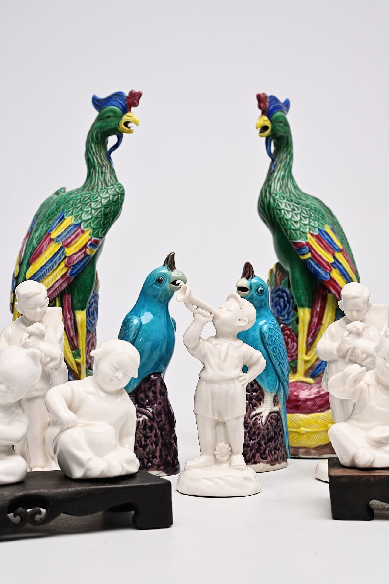 A pair of Chinese famille rose phoenixes, two pairs of turquoise parrots and nine blanc de Chine fig - Image 9 of 51