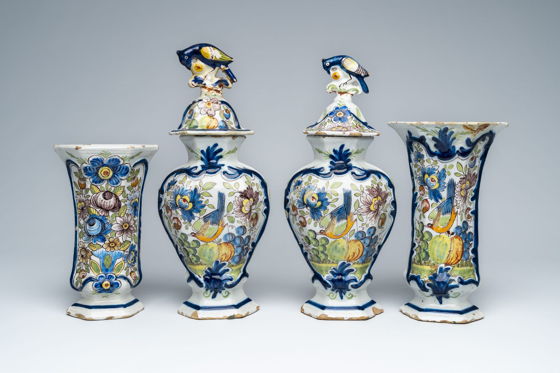 A polychrome Dutch Delft four-piece garniture, 18th C.