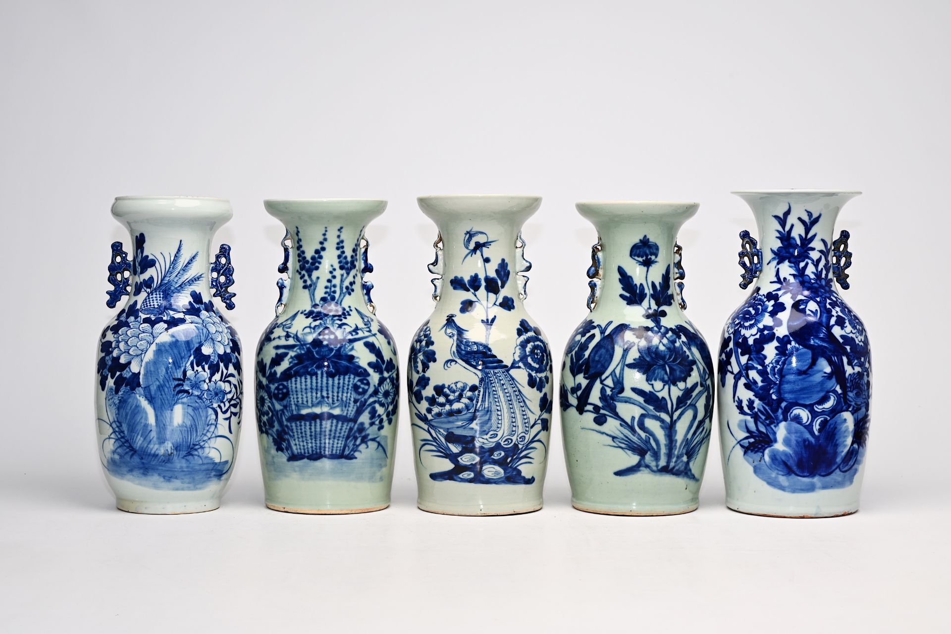 Five Chinese blue and white celadon ground vases with birds among blossoming branches and floral des