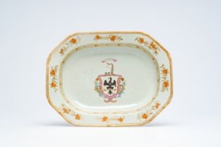 A Chinese famille rose English market armorial dish with the arms of Ramsay with a black eagle, a un