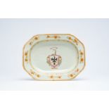 A Chinese famille rose English market armorial dish with the arms of Ramsay with a black eagle, a un