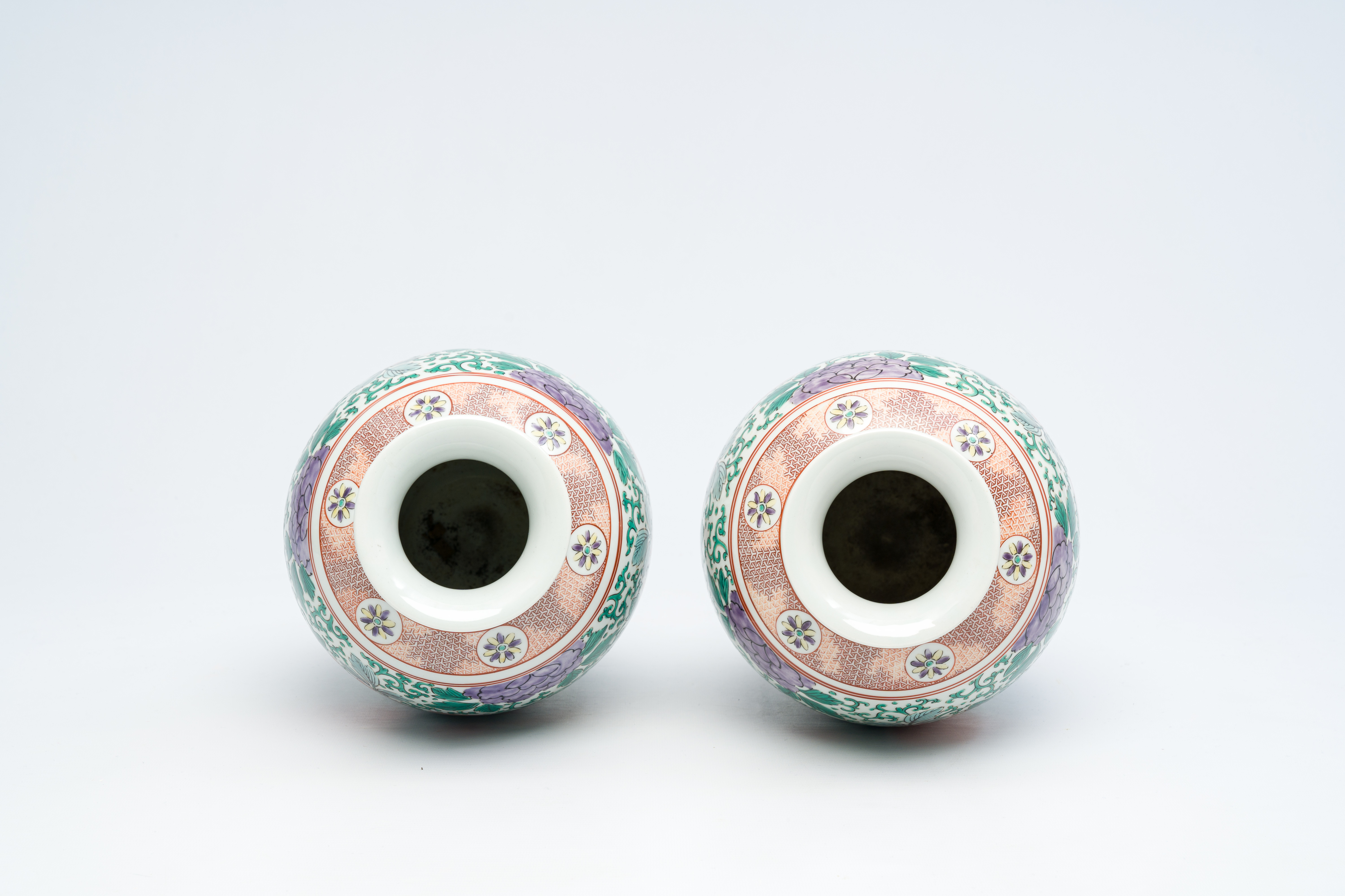 A pair of Japanese wucai style 'peony and Buddhist lions' vases, Meiji, ca. 1900 - Image 5 of 6