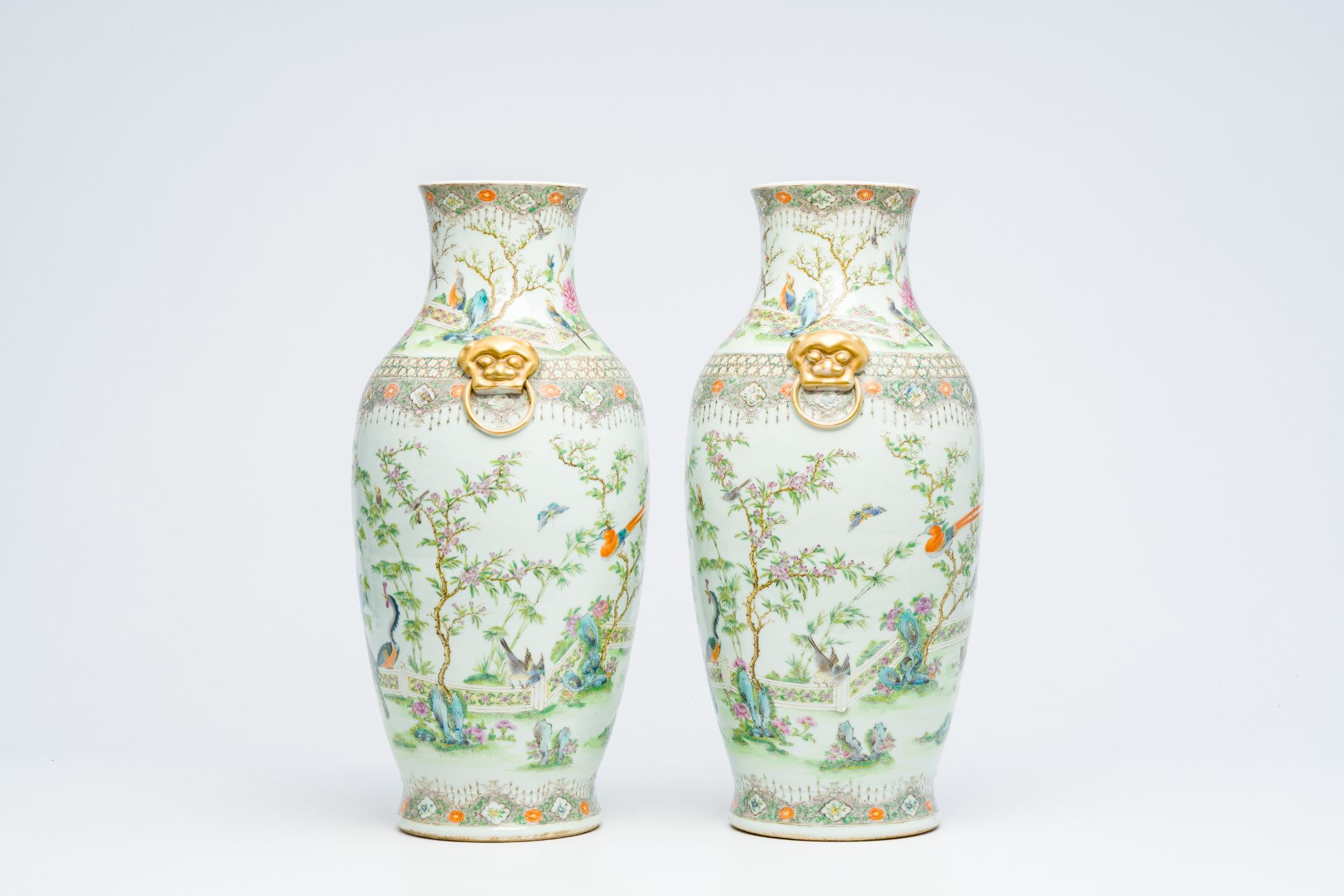 A pair of Chinese Canton famille rose vases with birds among blossoming branches, 19th C. - Image 4 of 6