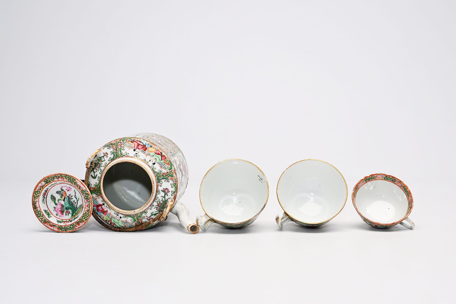 A Chinese Canton famille rose seventeen-part tea set and a bowl with palace scenes and floral design - Image 16 of 20