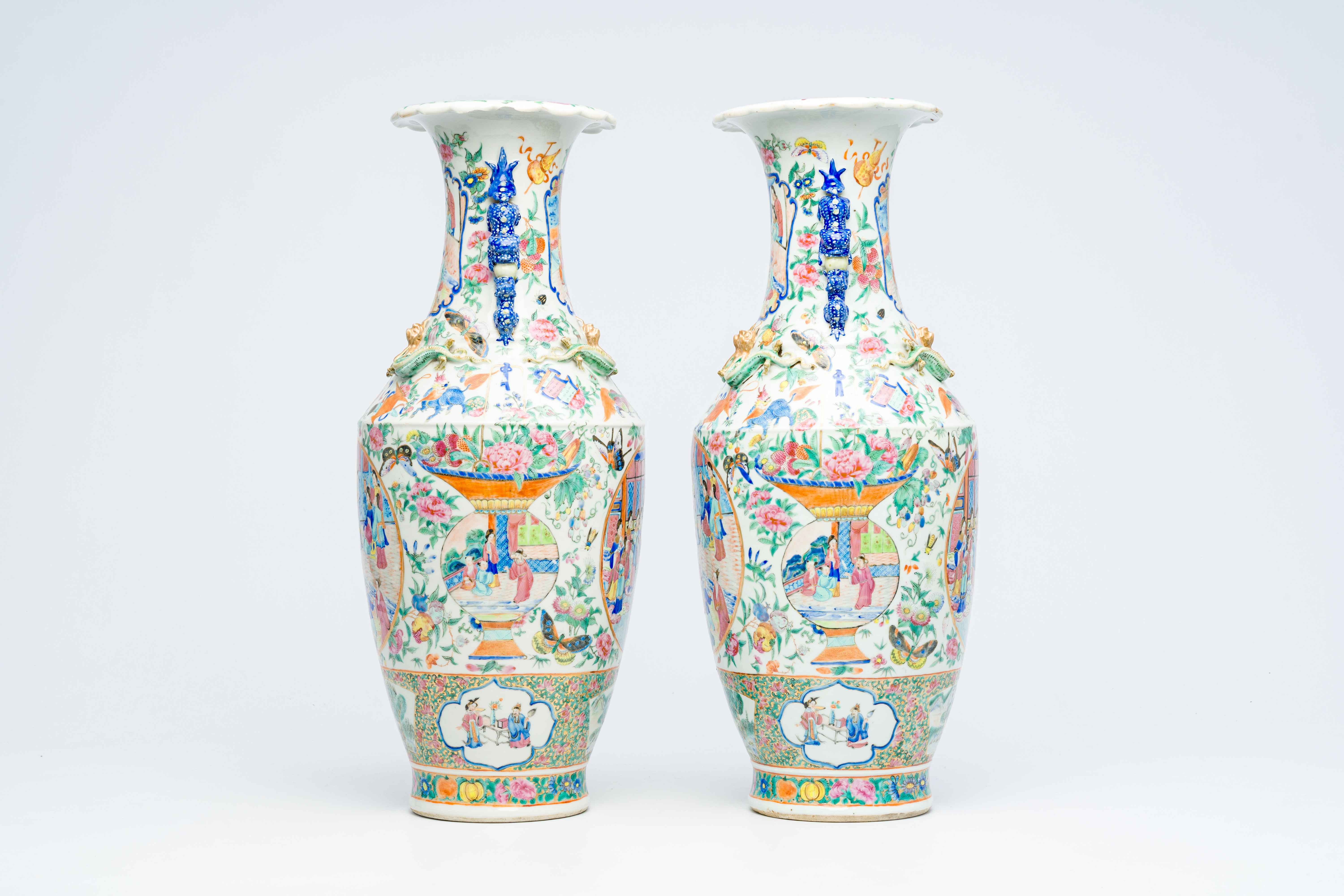 A pair of Chinese Canton famille rose vases with palace scenes, auspicious symbols and mythical anim - Image 2 of 6