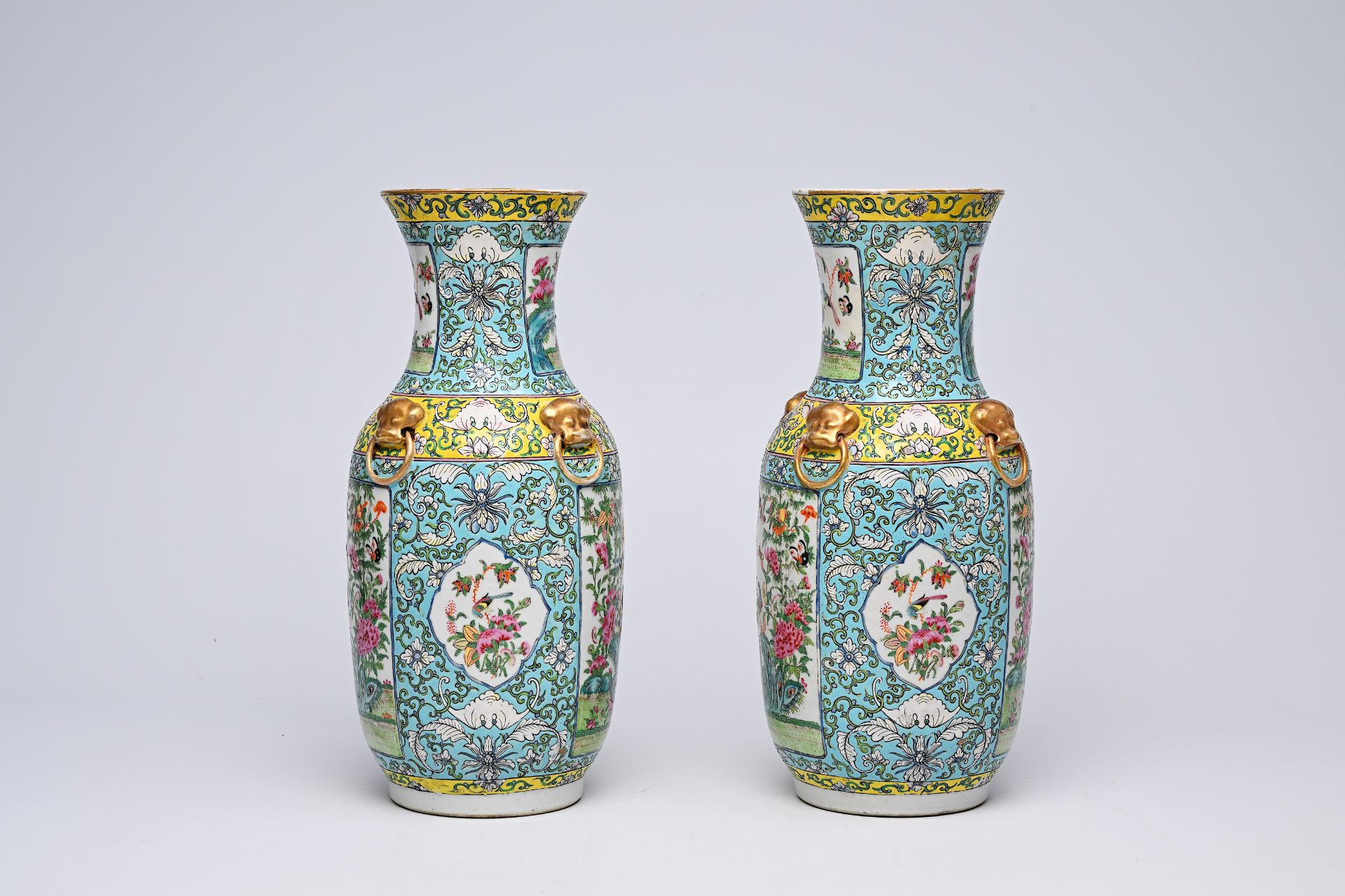A pair of Chinese Canton famille rose turquoise ground vases with birds and butterflies among blosso - Bild 4 aus 13