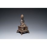 A large Chinese cast iron Buddha, late Ming
