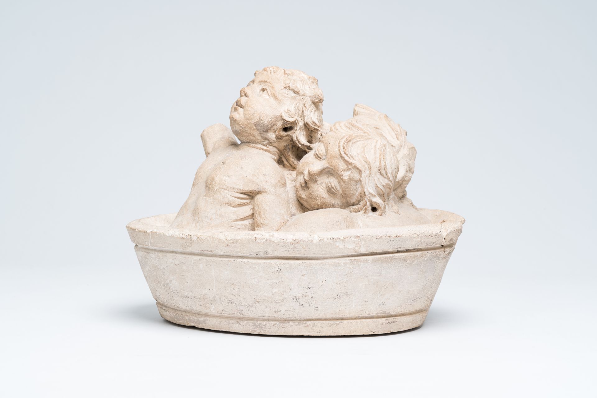A French limestone group depicting the three Saint Nicholas children in a tub, 16th C. - Image 2 of 8